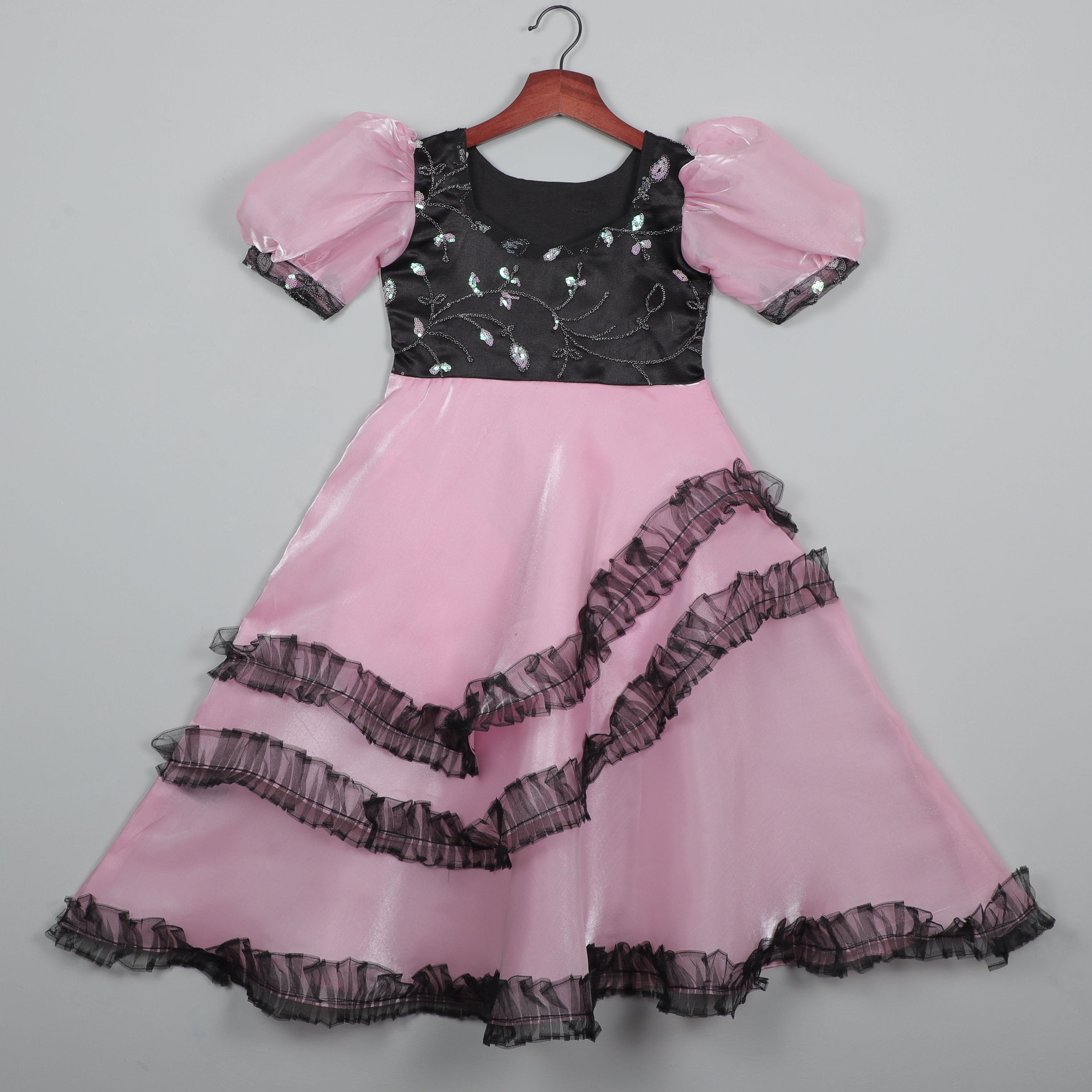 Girls Shiny Pink And Embroidery Work Gown With Ruffled Bottom Hem