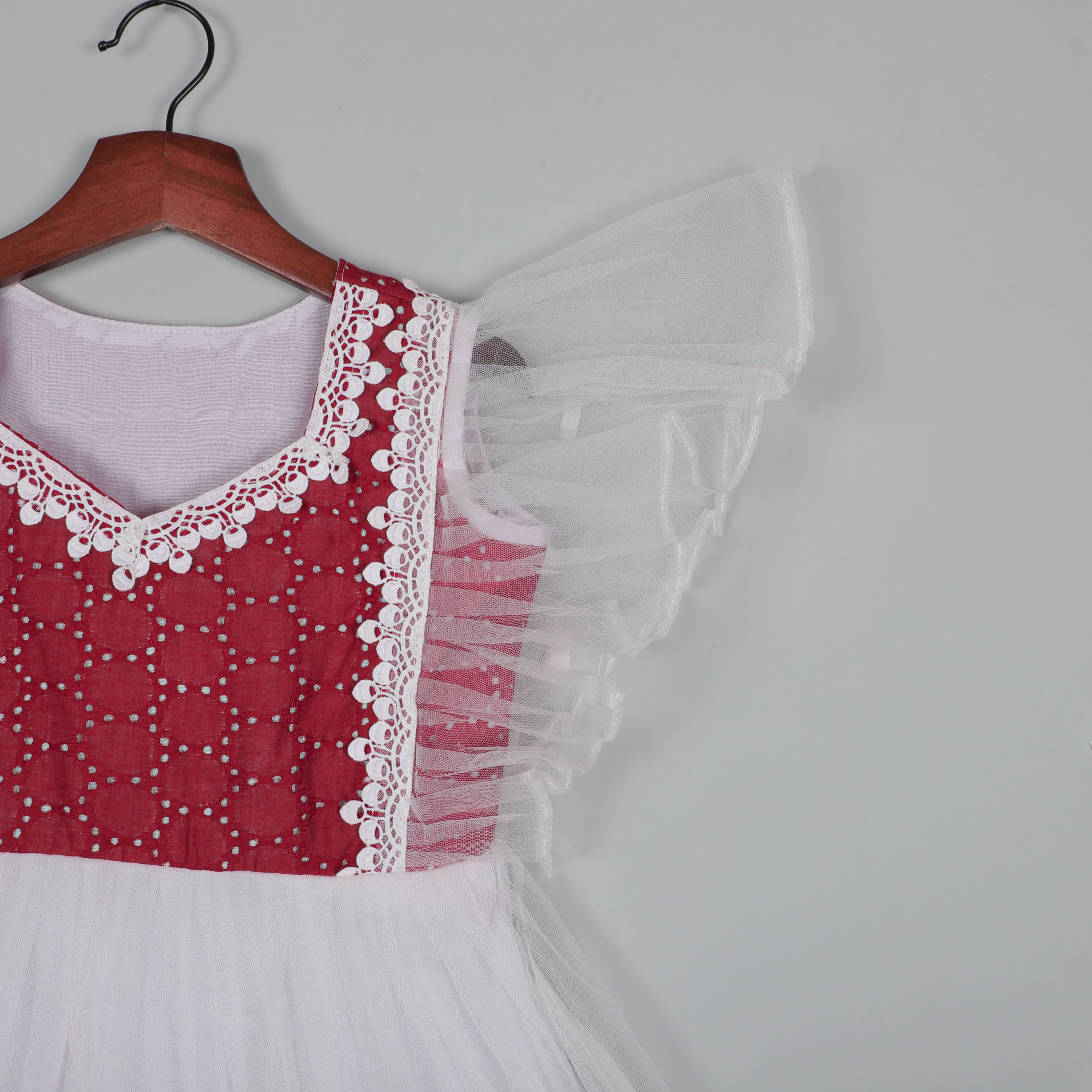 Fancy Flutter Sleeve Gown With Gotta Lace Border And Balloon Dot Cotton Fabric