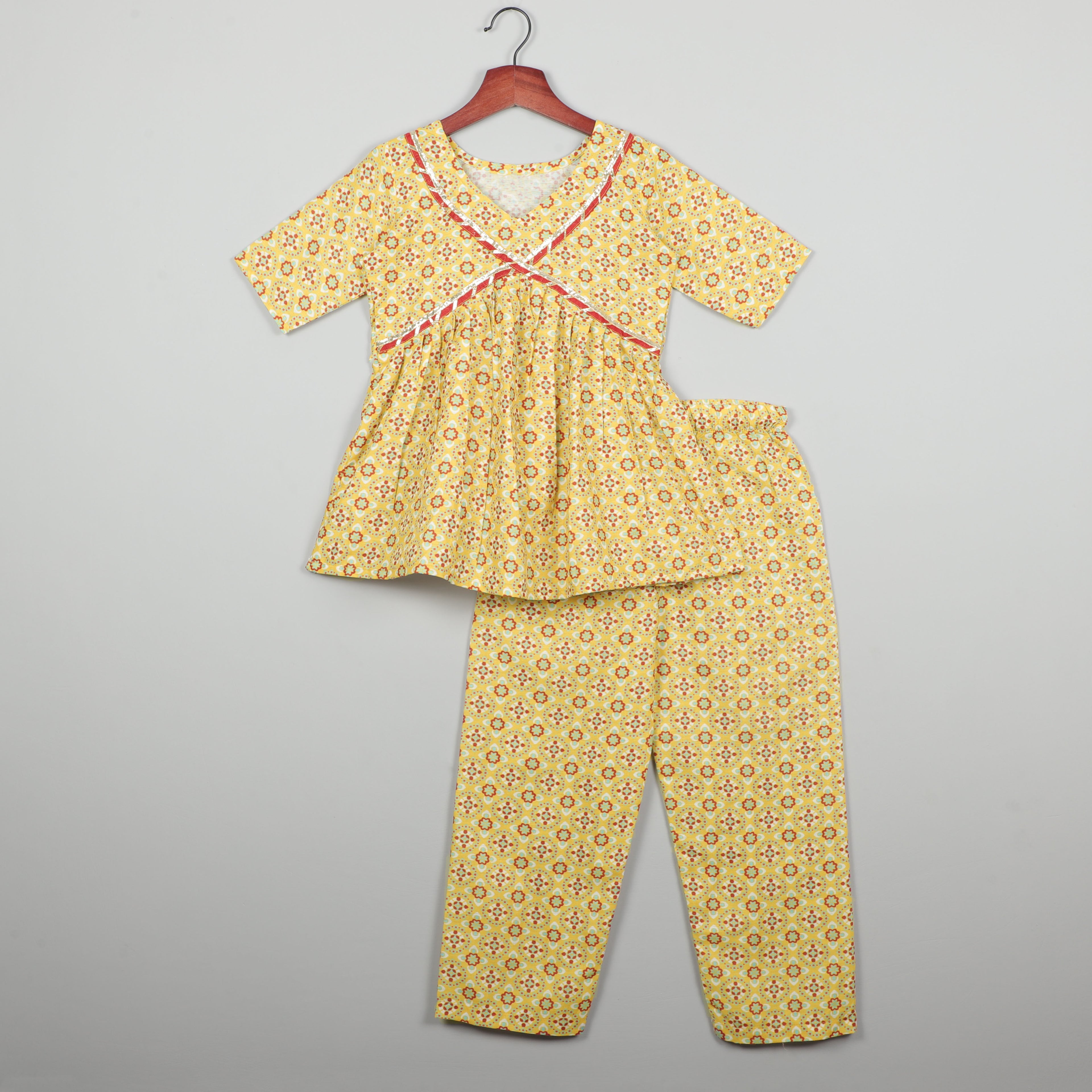 Girls Half Slevees Yellow Printed Cord Set With Red Lace Border