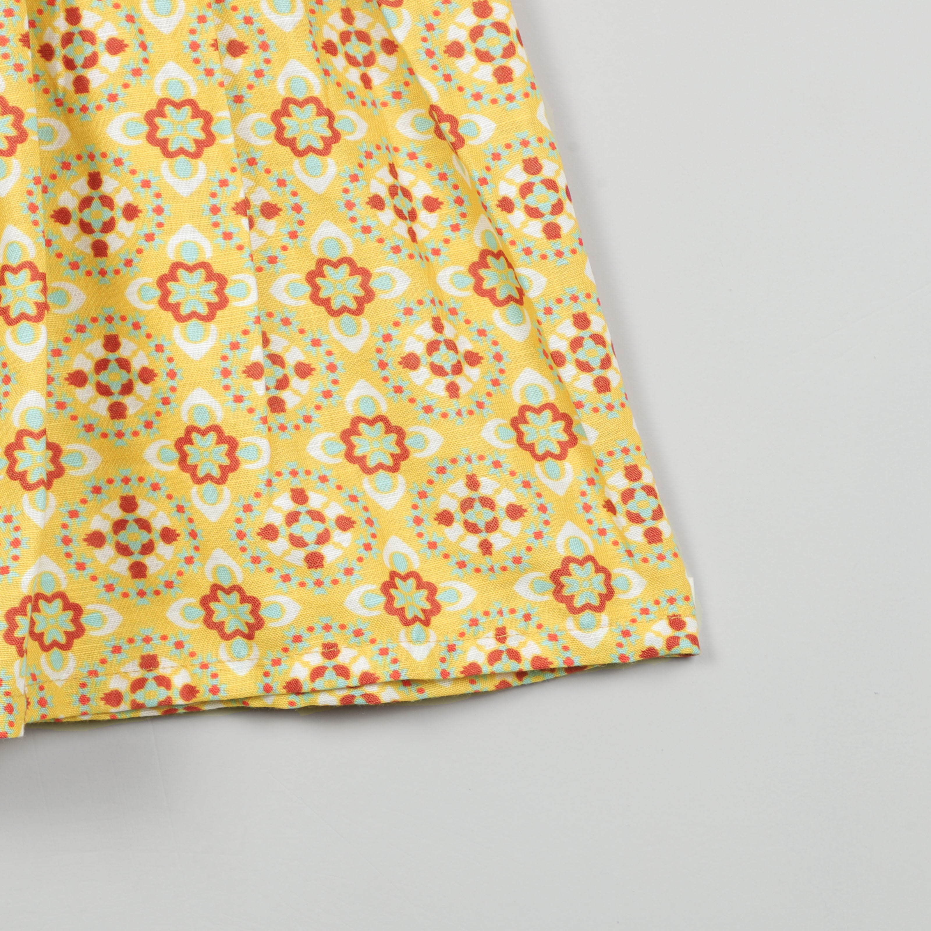 Girls Half Slevees Yellow Printed Cord Set With Red Lace Border