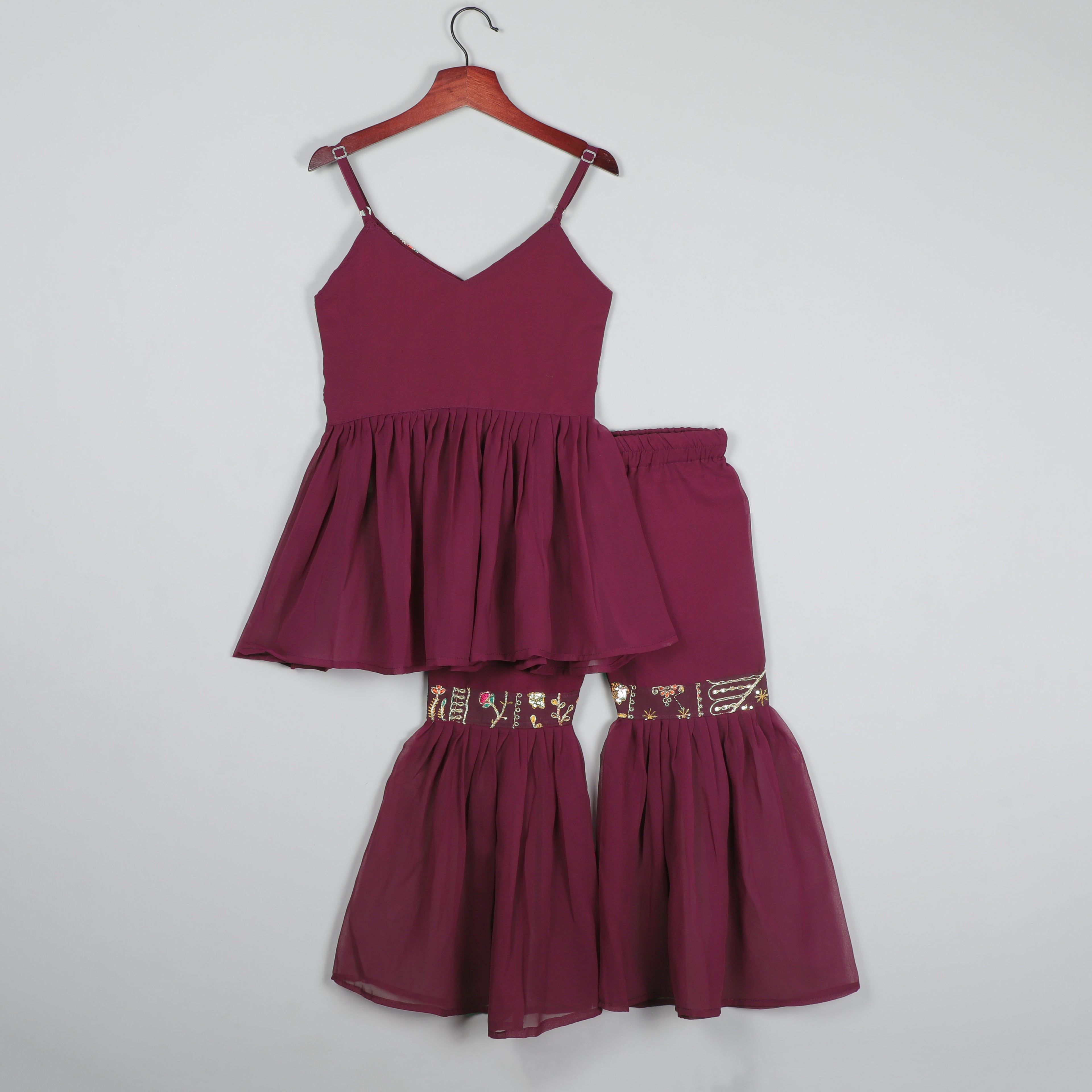 Sleeveless Top With Embroidery Work And Sharara Set