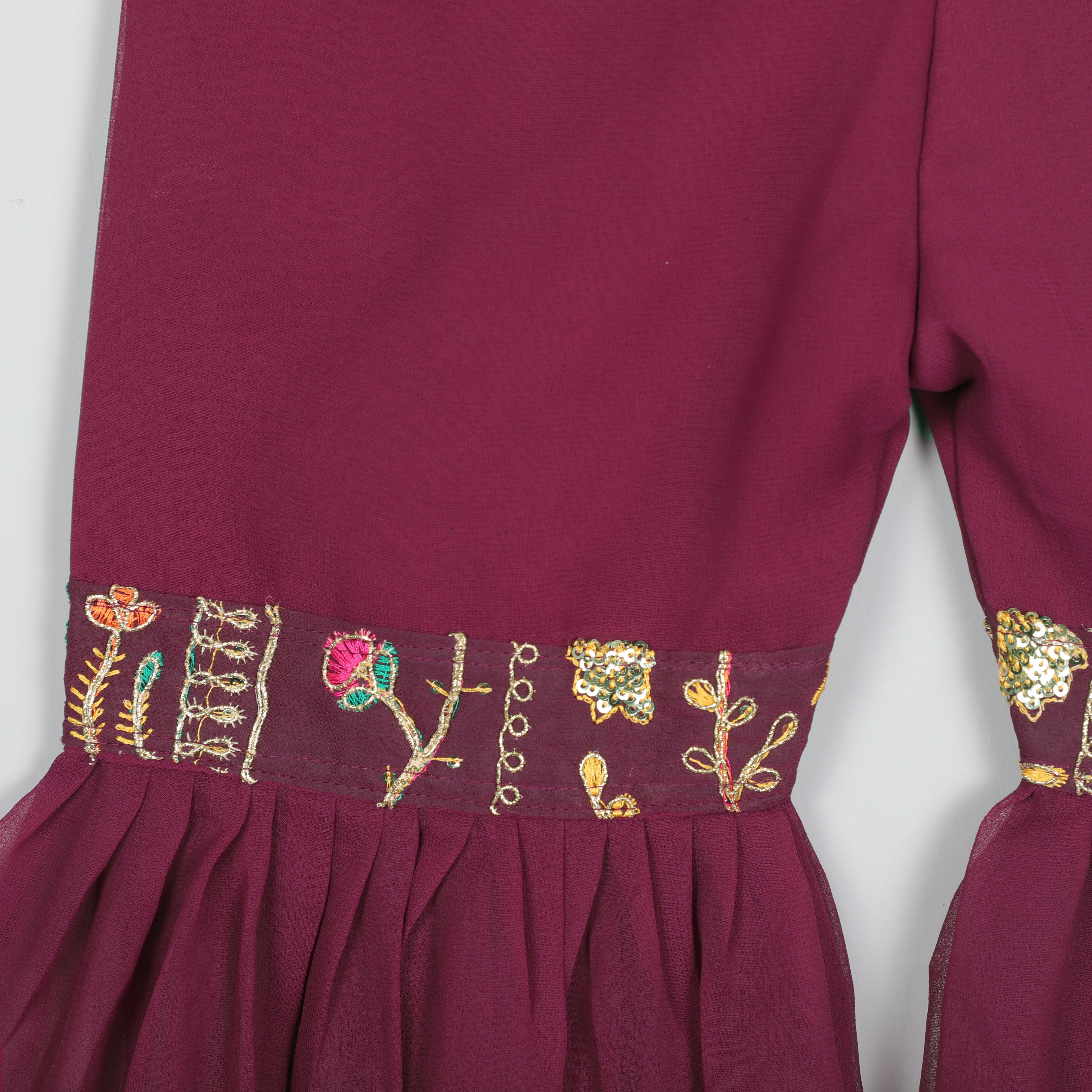 Sleeveless Top With Embroidery Work And Sharara Set