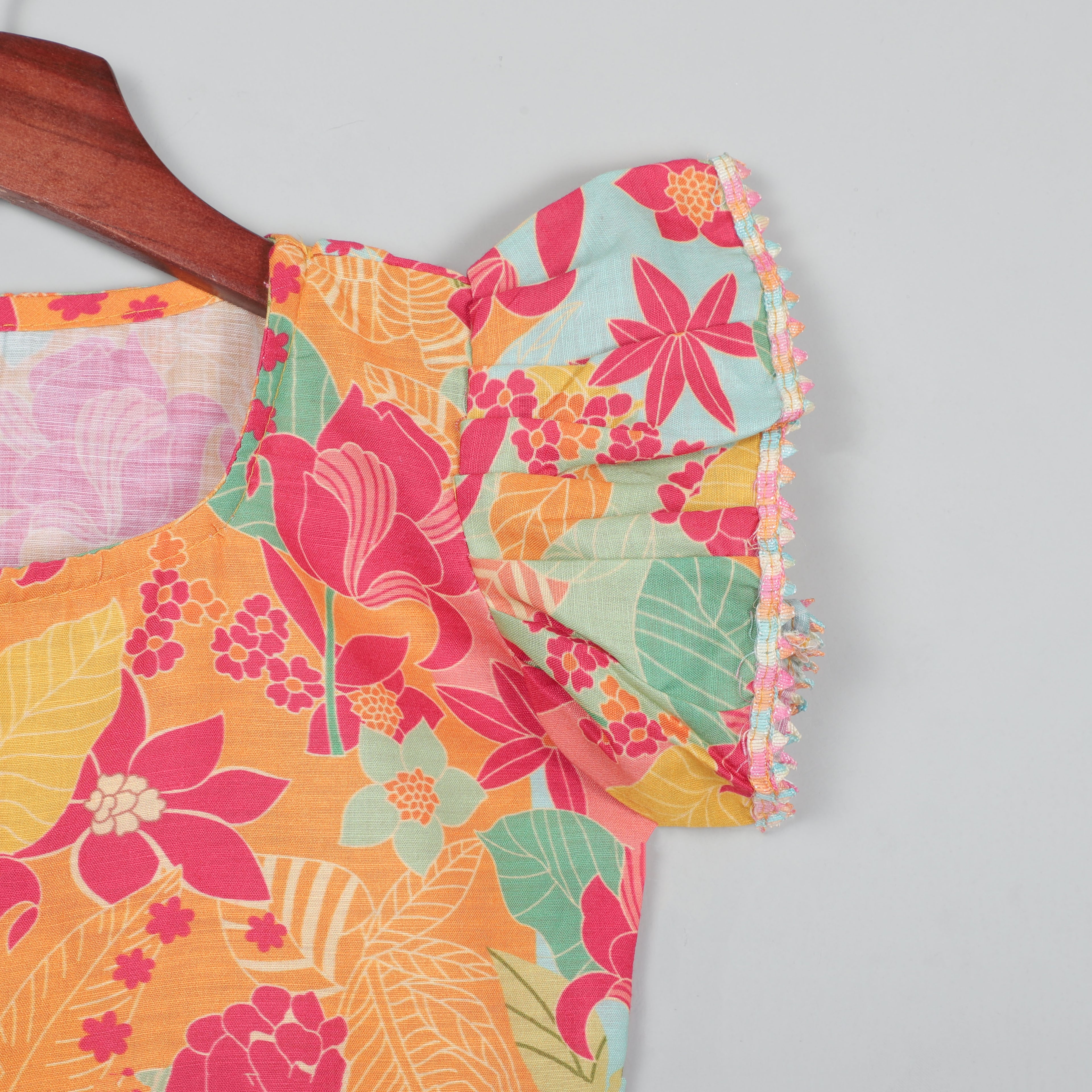 Top With Colorful Lace Border At Roll-up Sleeves And Striped Pant