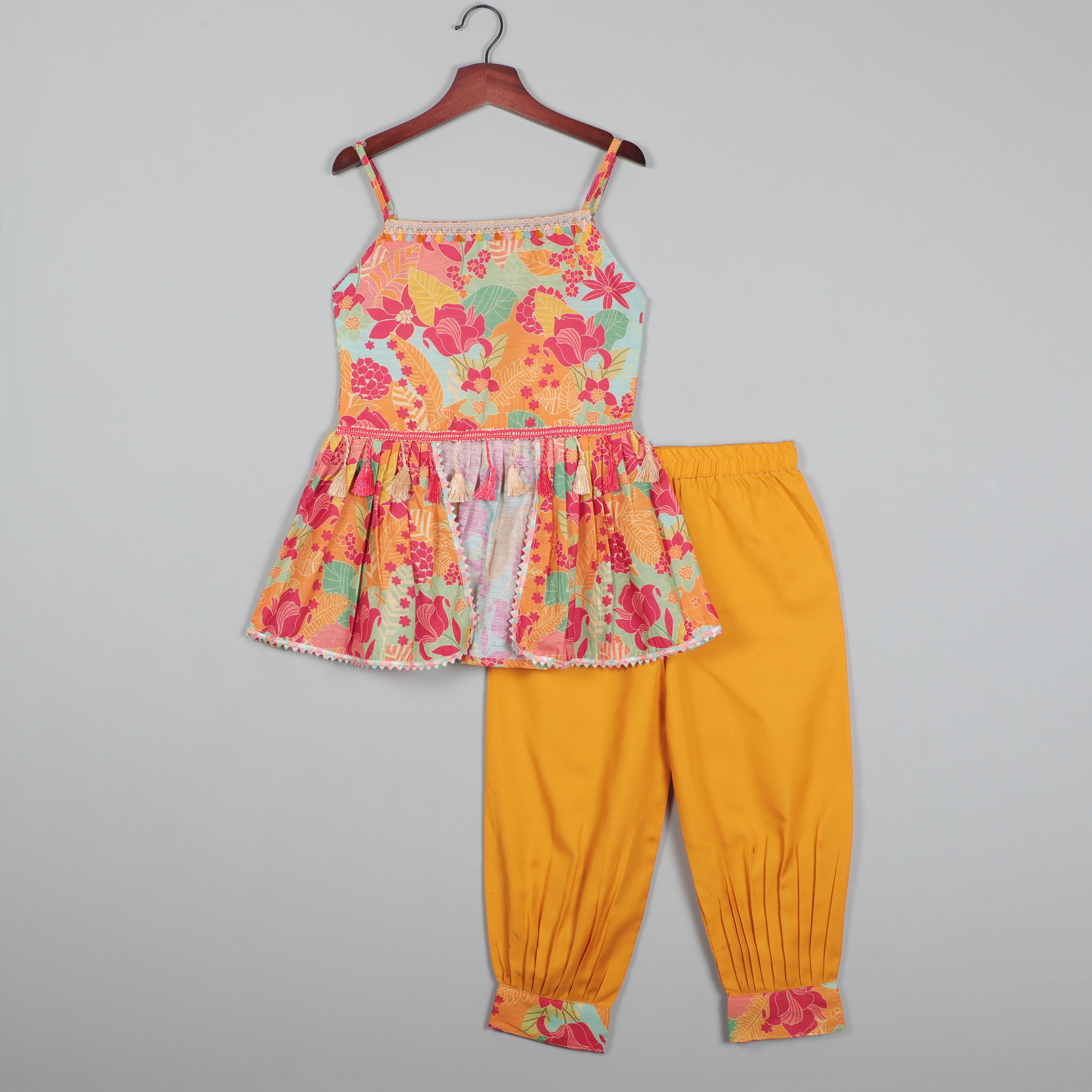 Strappy Top With Adjustable Knots To Tie  At The Back And Striped Pant