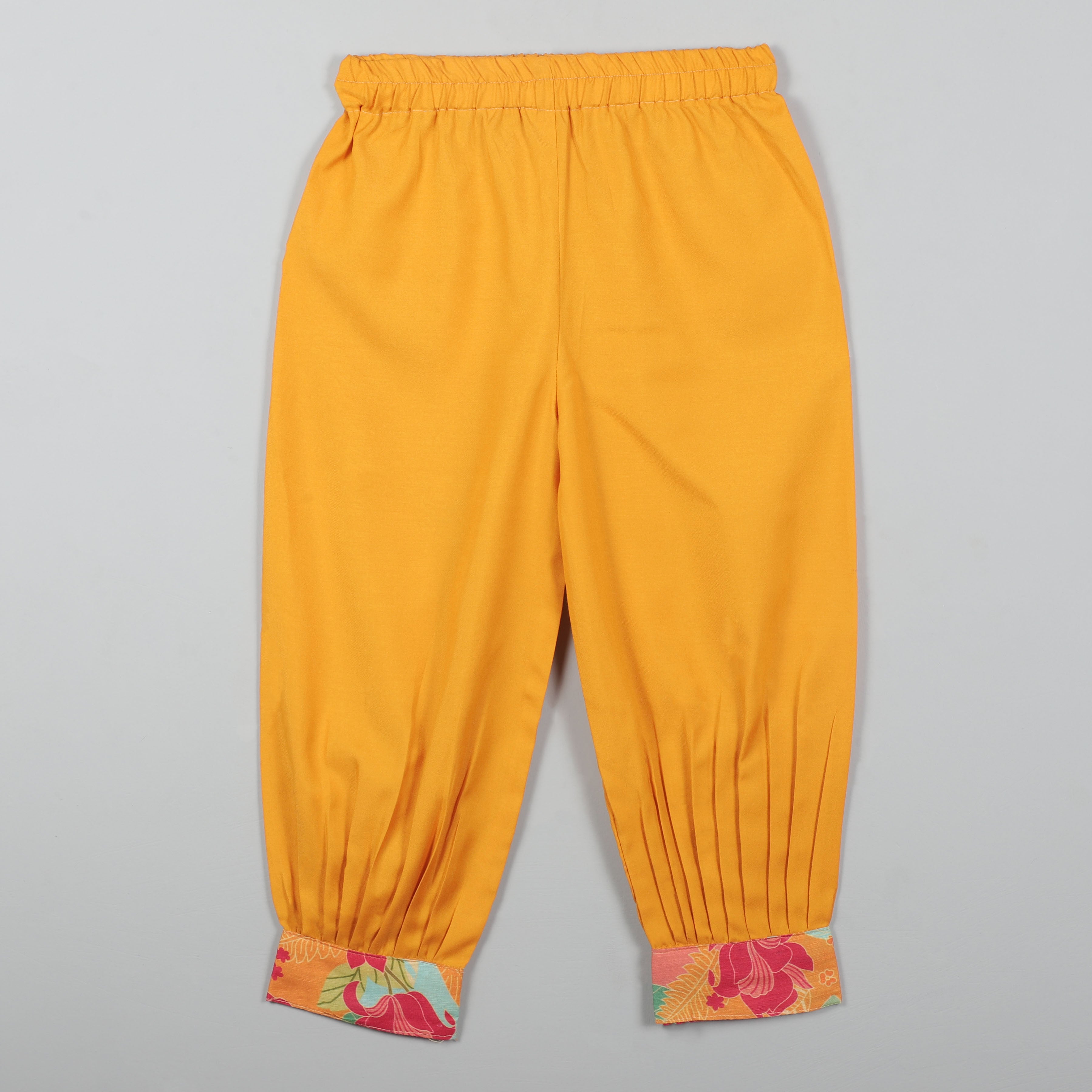 Strappy Top With Adjustable Knots To Tie  At The Back And Striped Pant