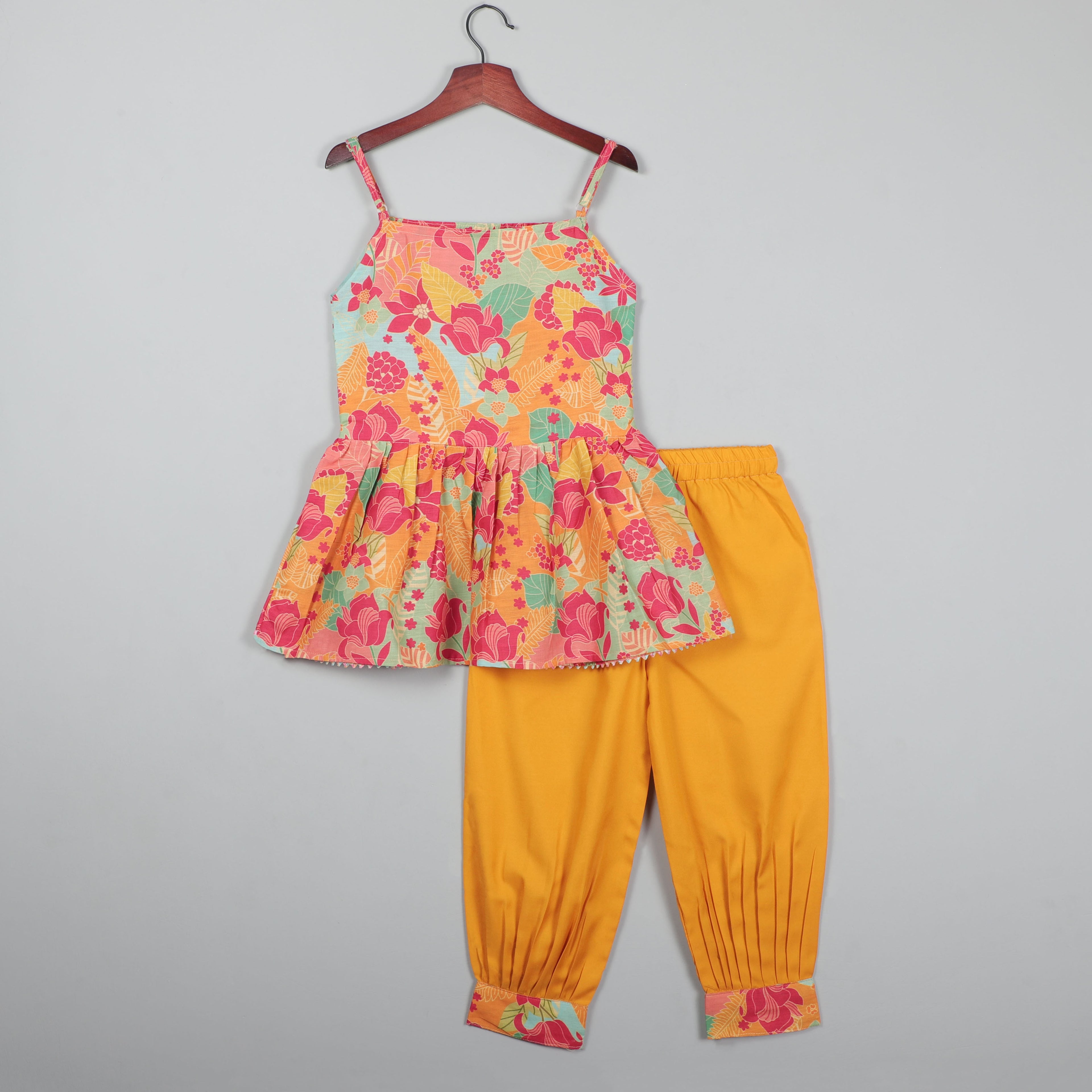 Strappy Top With Adjustable Knots To Tie  At The Back And Striped Pant